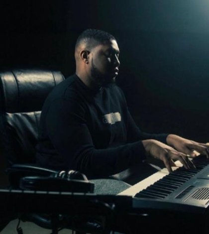 JaeCei composing at the keyboard in the studio